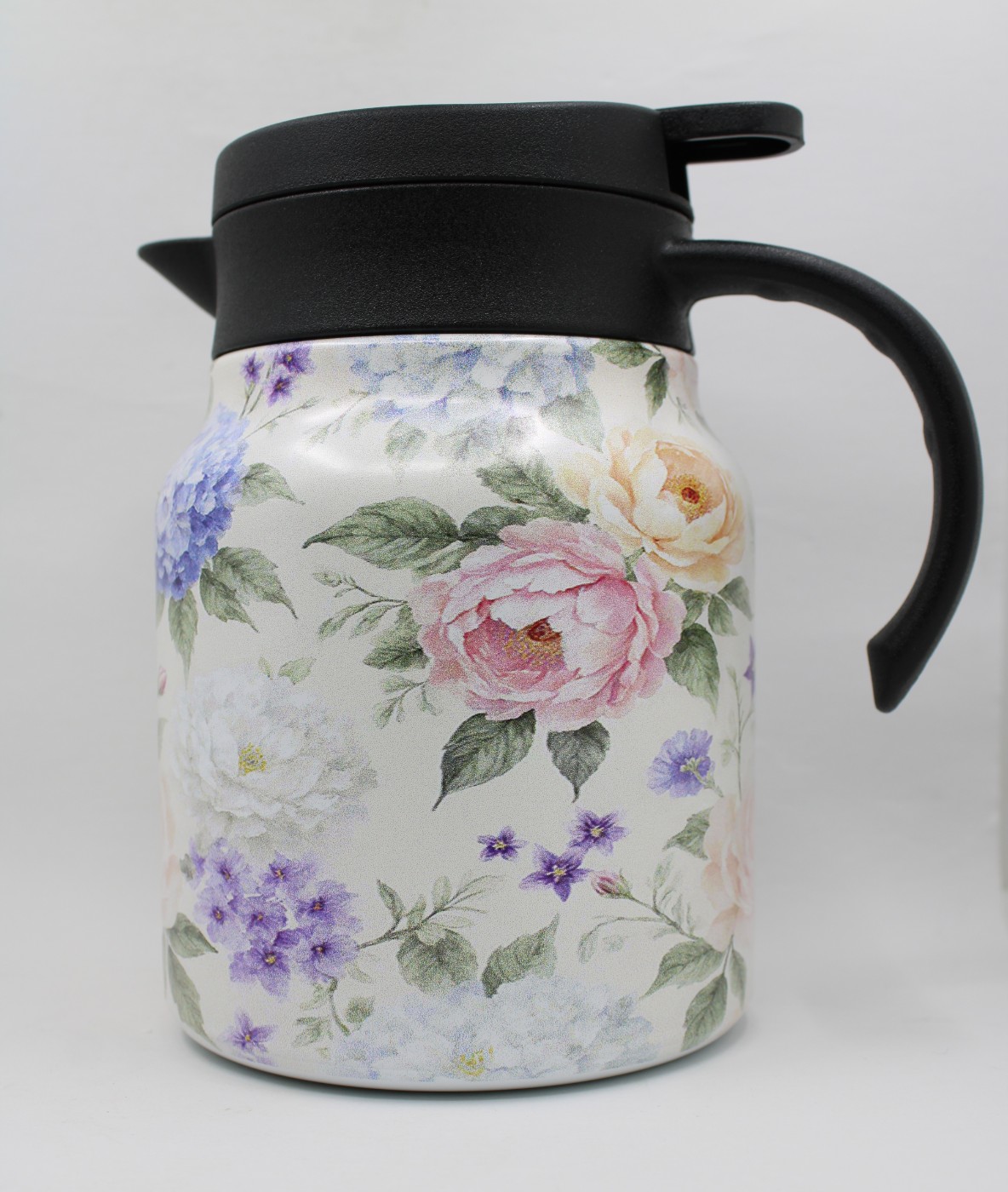 Theepot met theezeef - bloemen